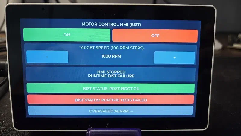 The HMI in its halted fault state after a simulated runtime BIST failure, motor power cut